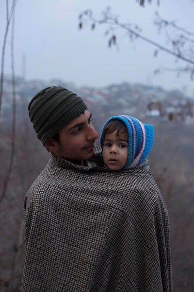 Arif Basheer is taking his niece home after consulting doctor at Govt sub district hospital. @ Cherari Sherif, Kashmir