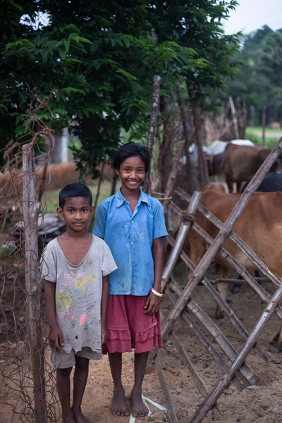 Deepthi with her younger brother. She studies in 6th level. Taken from Ramaram village, Sukma district. 