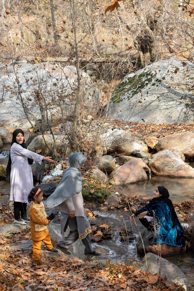 Relatives visiting Babagail village for a marriage taking photographs from the near by natural spots. Limber wildlife sanctuary,LoC, Baramulla/2023