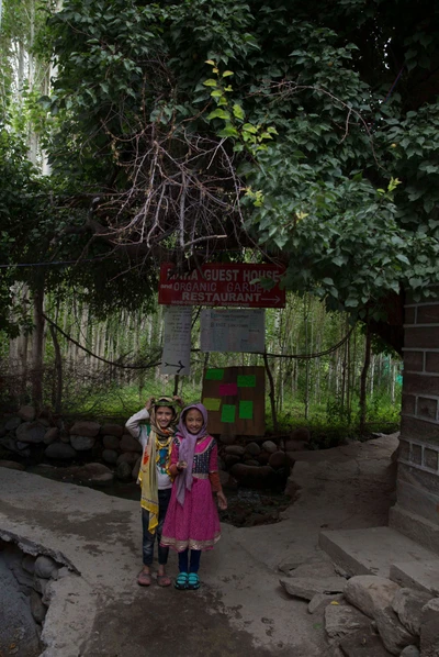 Mubeena and Safeena (right), both studying in level 3, posing with a pre-mature bird which slipped from above.
At Turtuk village, the northern-most village of India (2017)