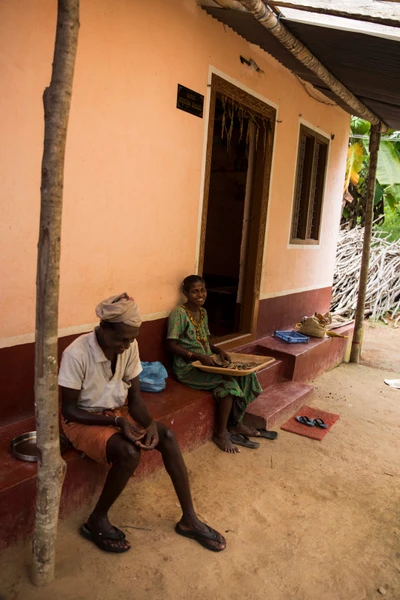  Janardhana and Shantha, the couple's daughters Janani and Janashree weren't home, but three children from the neighborhood (two boys and a girl) were present in the courtyard, beyond this frame. Alarme area, Kadaba taluk.