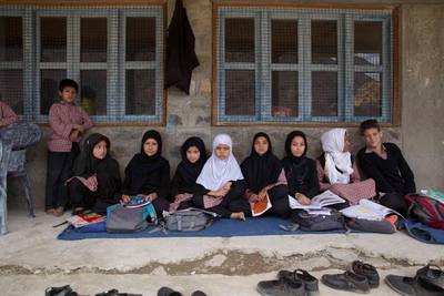 Students of level 8 attending a class on the veranda of Gound Middle Government school in Hardas, Kargil (2017). This school lies very close to an International border. 