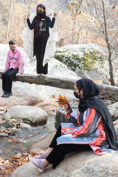 Relatives visiting Babagail village for a marriage taking photographs from the near by natural spots. Limber wildlife sanctuary,LoC, Baramulla/2023