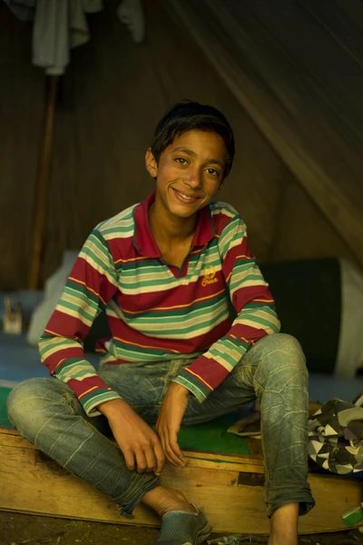 Mukthiar Ali is a pony driver, working full day on holidays and a few hours in the evening in school days. He is studying in 6th level in Sheikh Aalam Public school, Sonamarg, Kashmir. 