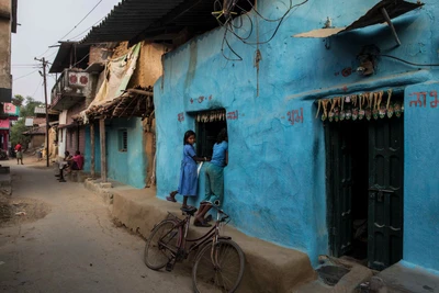 Taken from Amali Pali area in Gundal Our village, Sambalpur District. One looking into camera is Sujatha and she studies in 4 th standard. The other one, wearing pants, is Sujatha's school mate, but they are not close to each other.

