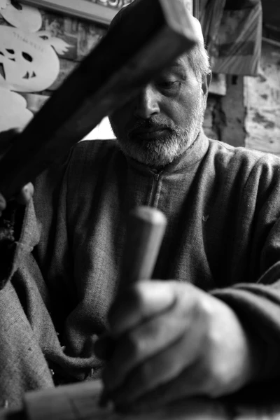 A carpenter in Lal Chowk. 2011